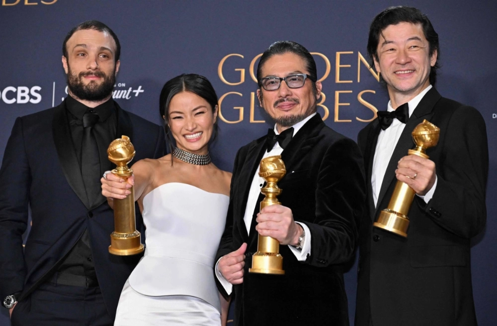 "Shogun" actors (from left) Cosmo Jarvis, Anna Sawai, Hiroyuki Sanada and Tadanobu Asano pose in the press room with the award for best drama television series during the 82nd annual Golden Globe Awards on Sunday. "Shogun" actors (from left) Cosmo Jarvis, Anna Sawai, Hiroyuki Sanada and Tadanobu Asano pose in the press room with the award for best drama television series during the 82nd annual Golden Globe Awards on Sunday.