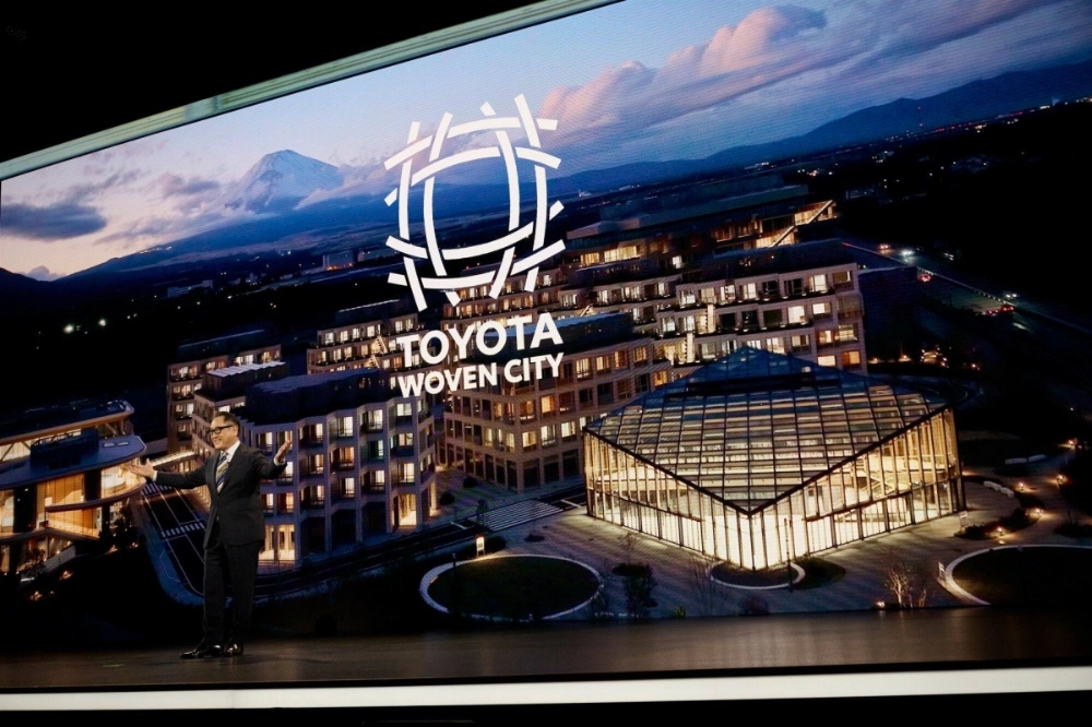 Toyota Chairman Akio Toyoda talks about the firm's Woven City smart town during the 2025 CES event in Las Vegas on Monday. Toyota Chairman Akio Toyoda talks about the firm's Woven City smart town during the 2025 CES event in Las Vegas on Monday.
