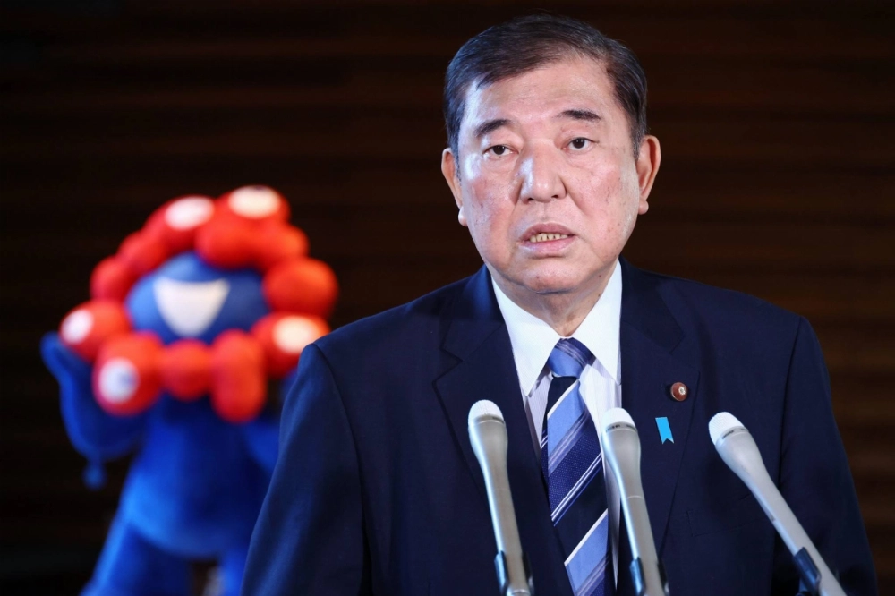 Prime Minister Shigeru Ishiba speaks to reporters in Tokyo Thursday before leaving for a trip to Malaysia and Indonesia. Prime Minister Shigeru Ishiba speaks to reporters in Tokyo Thursday before leaving for a trip to Malaysia and Indonesia.
