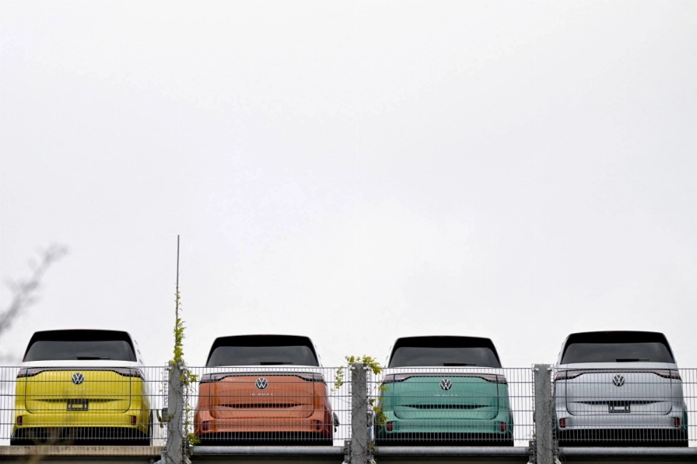 Volkswagen ID. Buzz electric vehicles are lined up at the company's plant in Hanover, Germany, on Dec. 17.  Volkswagen ID. Buzz electric vehicles are lined up at the company's plant in Hanover, Germany, on Dec. 17.