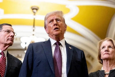 Republican Sen. John Barrasso of Wyoming (left), U.S. President-elect Donald Trump (center) and Republican Sen. Shelley Moore Capito of West Virginia, speak to members of the media following a meeting with Republican senators in Washington on Wednesday. Republican Sen. John Barrasso of Wyoming (left), U.S. President-elect Donald Trump (center) and Republican Sen. Shelley Moore Capito of West Virginia, speak to members of the media following a meeting with Republican senators in Washington on Wednesday.