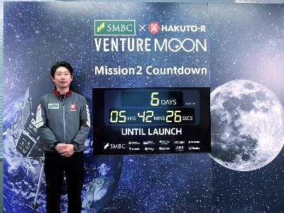 Ispace CEO Takeshi Hakamada with the countdown clock for the launch of the startup's lunar lander, in Tokyo's Chuo Ward on Thursday Ispace CEO Takeshi Hakamada with the countdown clock for the launch of the startup's lunar lander, in Tokyo's Chuo Ward on Thursday