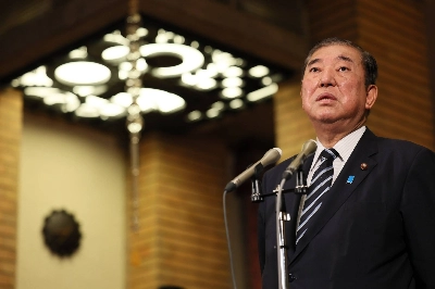 Prime Minister Shigeru Ishiba speaks to reporters after a three-way virtual summit with U.S. President Joe Biden and Philippine President Ferdinand Marcos Jr. on Monday.  Prime Minister Shigeru Ishiba speaks to reporters after a three-way virtual summit with U.S. President Joe Biden and Philippine President Ferdinand Marcos Jr. on Monday.