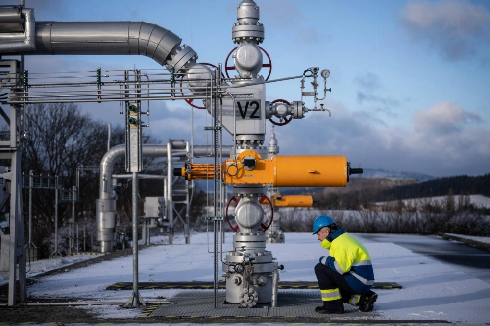 A worker inspects the outdoor gas pipes at the underground gas storage facility operated by Gas Storage in Haje, Czech Republic, on Jan. 3. A worker inspects the outdoor gas pipes at the underground gas storage facility operated by Gas Storage in Haje, Czech Republic, on Jan. 3.