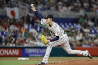 Japan starting pitcher Roki Sasaki delivers a pitch during the first inning of a World Baseball Classic semifinal game against Mexico in Miami in March 2023. | USA TODAY / via Reuters