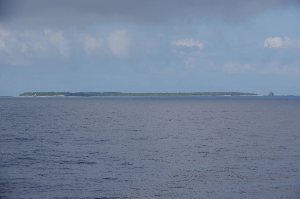 Yanaha Island in Okinawa Prefecture as seen from a ferry.  Yanaha Island in Okinawa Prefecture as seen from a ferry.