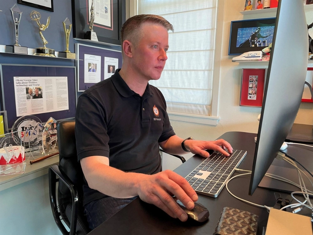 Curtis Sparrer, founder of the public relations agency Bospar, sits at his desk in his apartment in San Francisco on Jan. 9. Curtis Sparrer, founder of the public relations agency Bospar, sits at his desk in his apartment in San Francisco on Jan. 9.