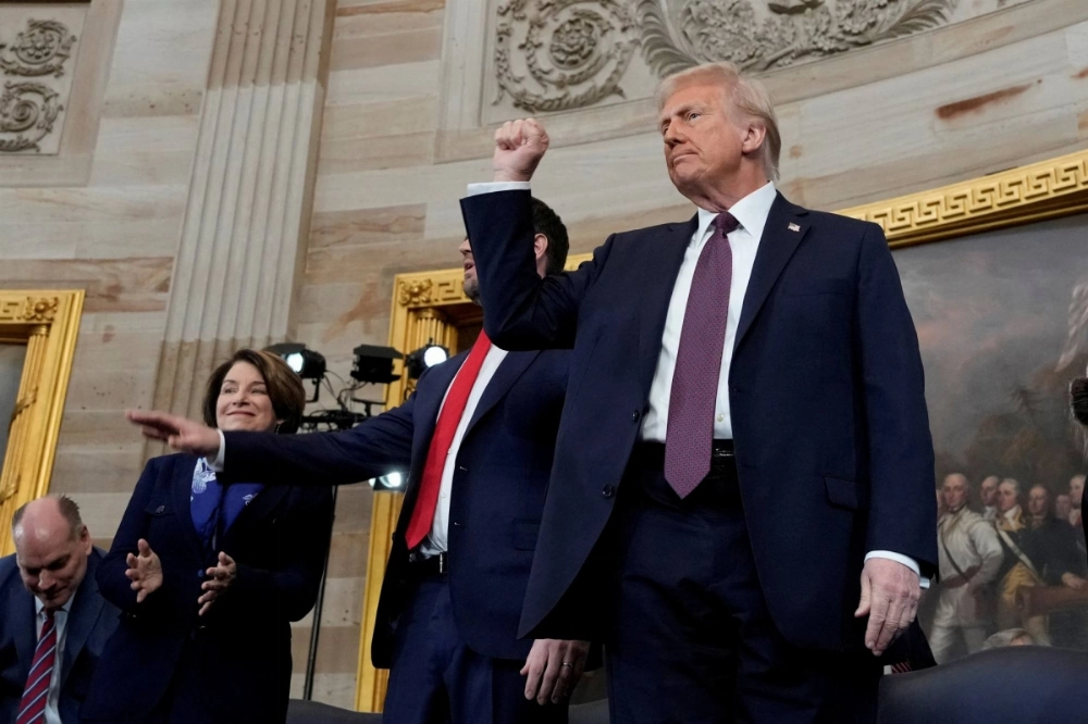 U.S. President Donald Trump takes the stage with Vice President JD Vance after being sworn in as the 47th president of the United States during the presidential inauguration in Washington on Monday. U.S. President Donald Trump takes the stage with Vice President JD Vance after being sworn in as the 47th president of the United States during the presidential inauguration in Washington on Monday.