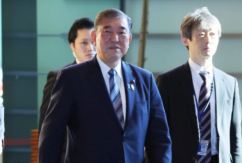 Prime Minister Shigeru Ishiba enters the Prime Minister's Office in Tokyo on Friday. Prime Minister Shigeru Ishiba enters the Prime Minister's Office in Tokyo on Friday.