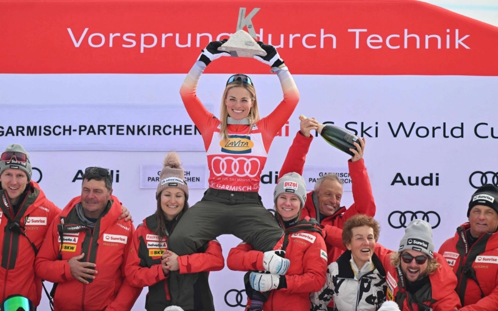 Lara Gut-Behrami celebrates with her team after winning the women's World Cup super-G in Garmisch-Partenkirchen, Germany, on Sunday. Lara Gut-Behrami celebrates with her team after winning the women's World Cup super-G in Garmisch-Partenkirchen, Germany, on Sunday.