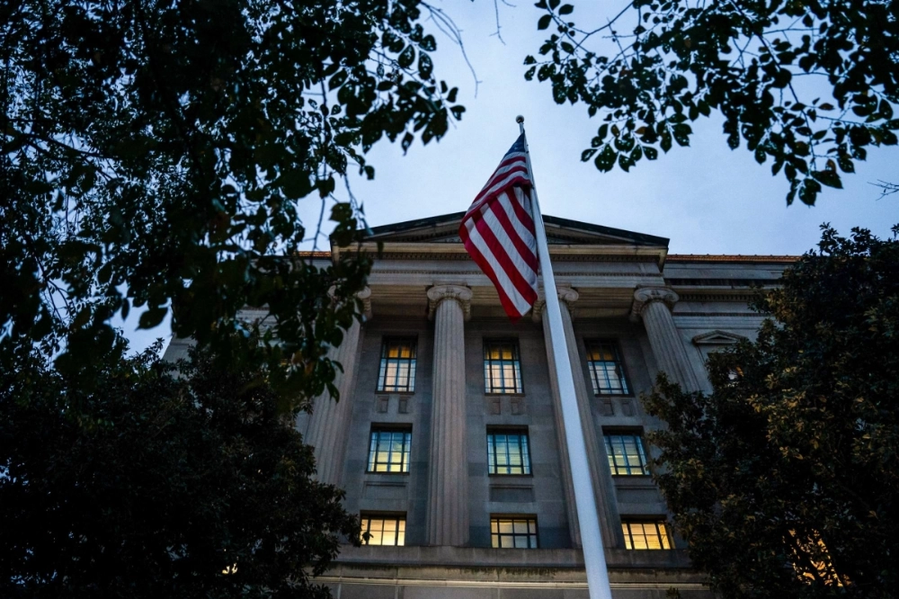 More than a dozen Justice Department lawyers were fired after Acting Attorney General James McHenry, a Trump appointee, concluded they "could not be trusted to faithfully implement the President’s agenda because of their significant role in prosecuting the President," a Justice Department official said. More than a dozen Justice Department lawyers were fired after Acting Attorney General James McHenry, a Trump appointee, concluded they "could not be trusted to faithfully implement the President’s agenda because of their significant role in prosecuting the President," a Justice Department official said.
