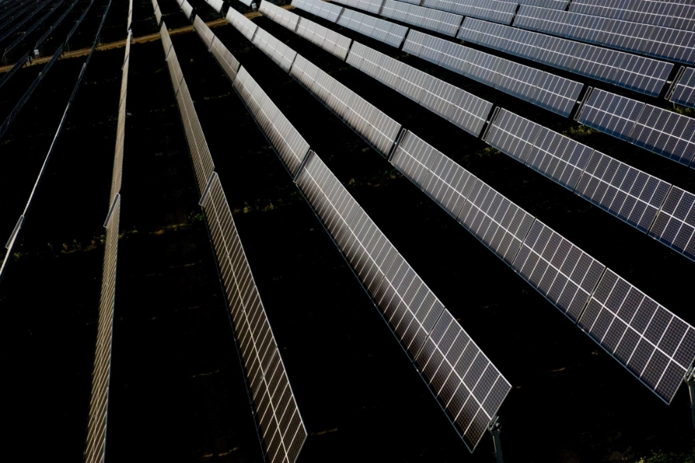 A solar farm in Lennon, Michigan, in 2021. In an executive order, President Donald Trump pointedly excluded green technology like solar panels from his definition of energy.  A solar farm in Lennon, Michigan, in 2021. In an executive order, President Donald Trump pointedly excluded green technology like solar panels from his definition of energy.