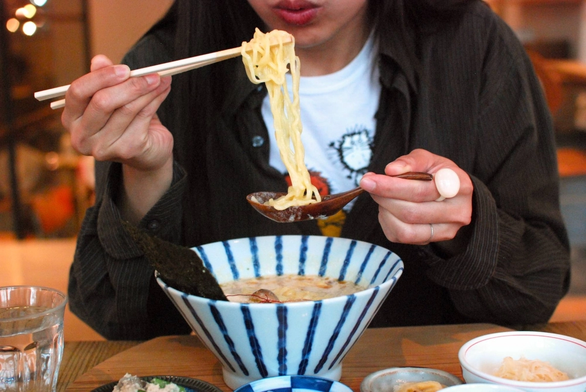 Mumokuteki, a natural lifestyle store with a cafe, serves up soy milk-based ramen on its all-vegan menu at its location on the busy Teramachi shopping street in the city of Kyoto. Mumokuteki, a natural lifestyle store with a cafe, serves up soy milk-based ramen on its all-vegan menu at its location on the busy Teramachi shopping street in the city of Kyoto.