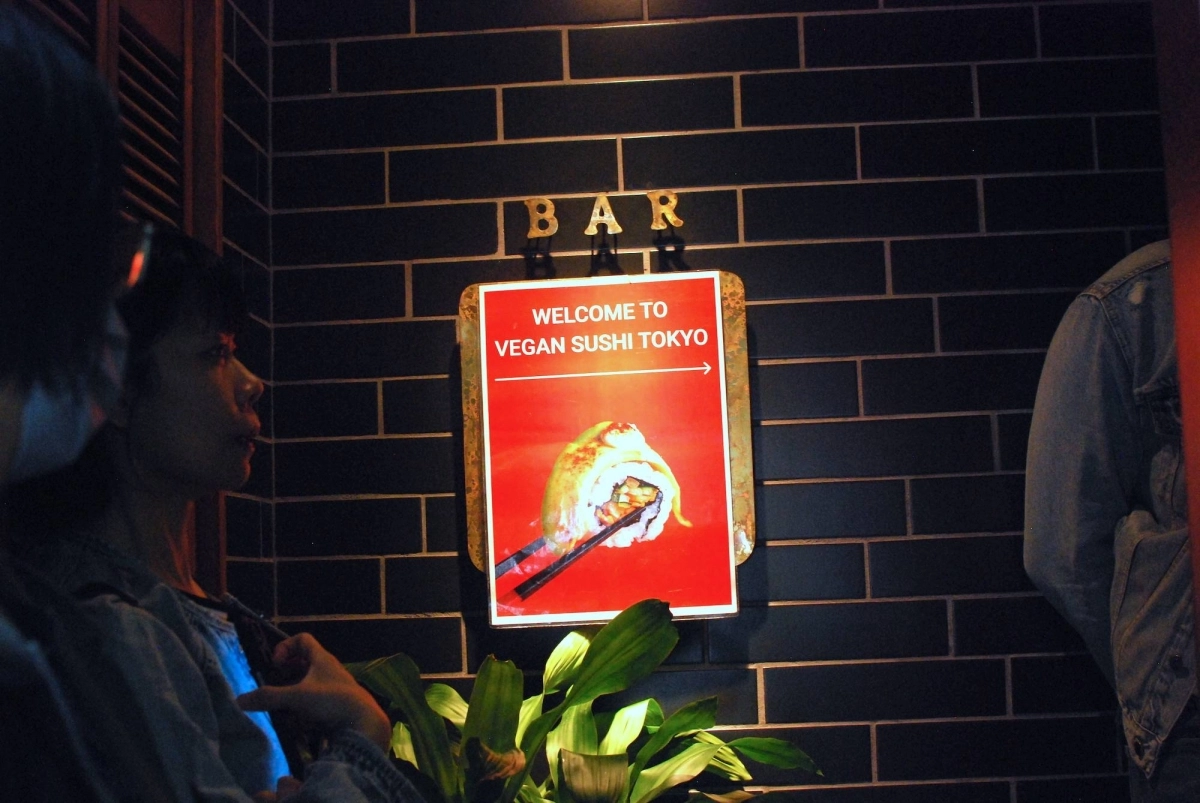 The first guests of the day line up outside the door of Vegan Sushi Tokyo in the Shibuya district. The first guests of the day line up outside the door of Vegan Sushi Tokyo in the Shibuya district.