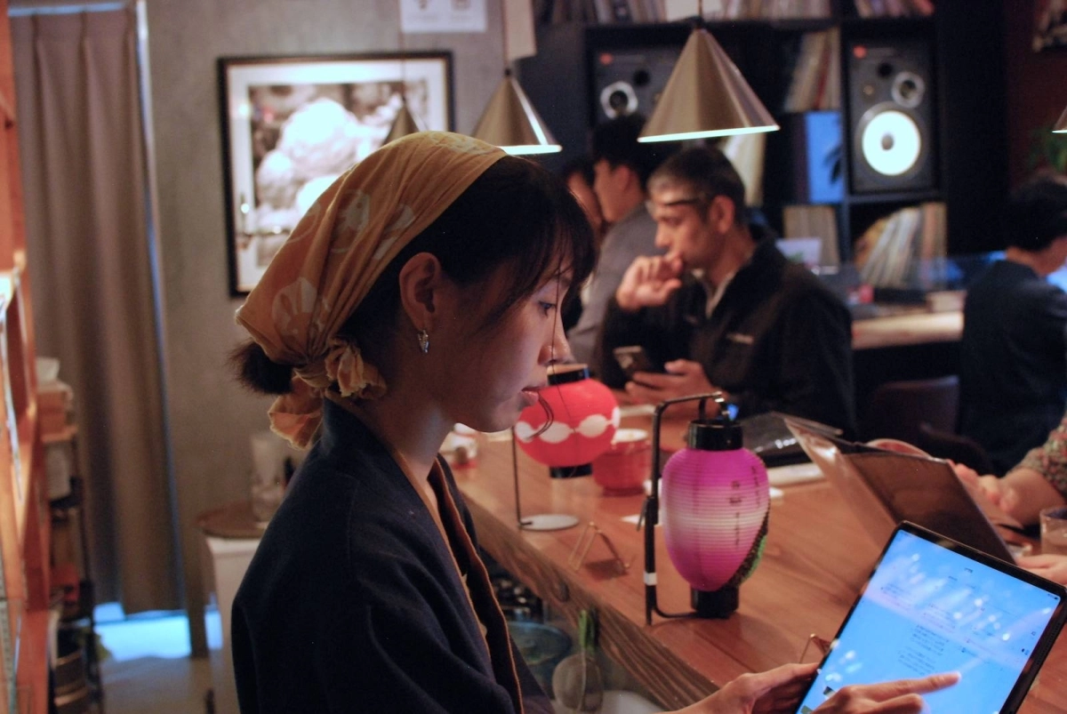 Kazue Maeda, co-founder of Vegan Sushi Tokyo, serves customers at the restaurant, where the recommended lunch set includes a tray of faux-fish sushi.  Kazue Maeda, co-founder of Vegan Sushi Tokyo, serves customers at the restaurant, where the recommended lunch set includes a tray of faux-fish sushi.