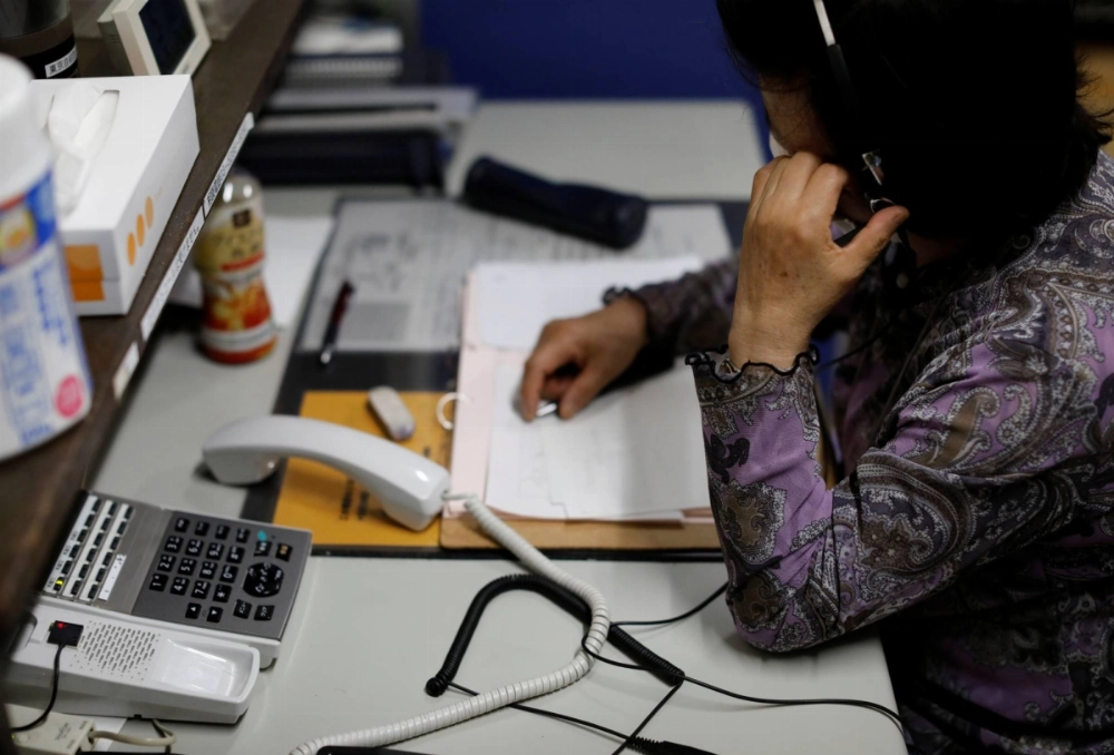 A volunteer responds an incoming call at a suicide hotline center in Tokyo. While the number of people who killed themselves in Japan marked the second-lowest level since 2019, such deaths among elementary, junior high and high school students were at their highest level since records began in 1980. A volunteer responds an incoming call at a suicide hotline center in Tokyo. While the number of people who killed themselves in Japan marked the second-lowest level since 2019, such deaths among elementary, junior high and high school students were at their highest level since records began in 1980.