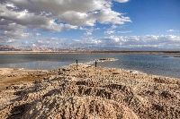 Rock patterns formed by crystalized minerals along the Dead Sea shore near Kibbutz Ein Gedi in eastern Israel on Dec. 30. The Dead Sea, nestled where Israeli, Jordanian and Palestinian territory meet, has famously been dying for years. | AFP-JIJI