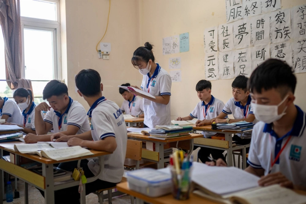 A Japanese class at a job placement company in Hanoi in 2022. The number of foreign workers in Japan hit a record high in 2024. A Japanese class at a job placement company in Hanoi in 2022. The number of foreign workers in Japan hit a record high in 2024.