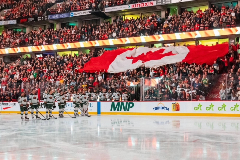A Canadian flag is displayed in the stands during the Canadian national anthem prior to the start of a game between the Senators and the Wild in Ottawa on Saturday. A Canadian flag is displayed in the stands during the Canadian national anthem prior to the start of a game between the Senators and the Wild in Ottawa on Saturday.