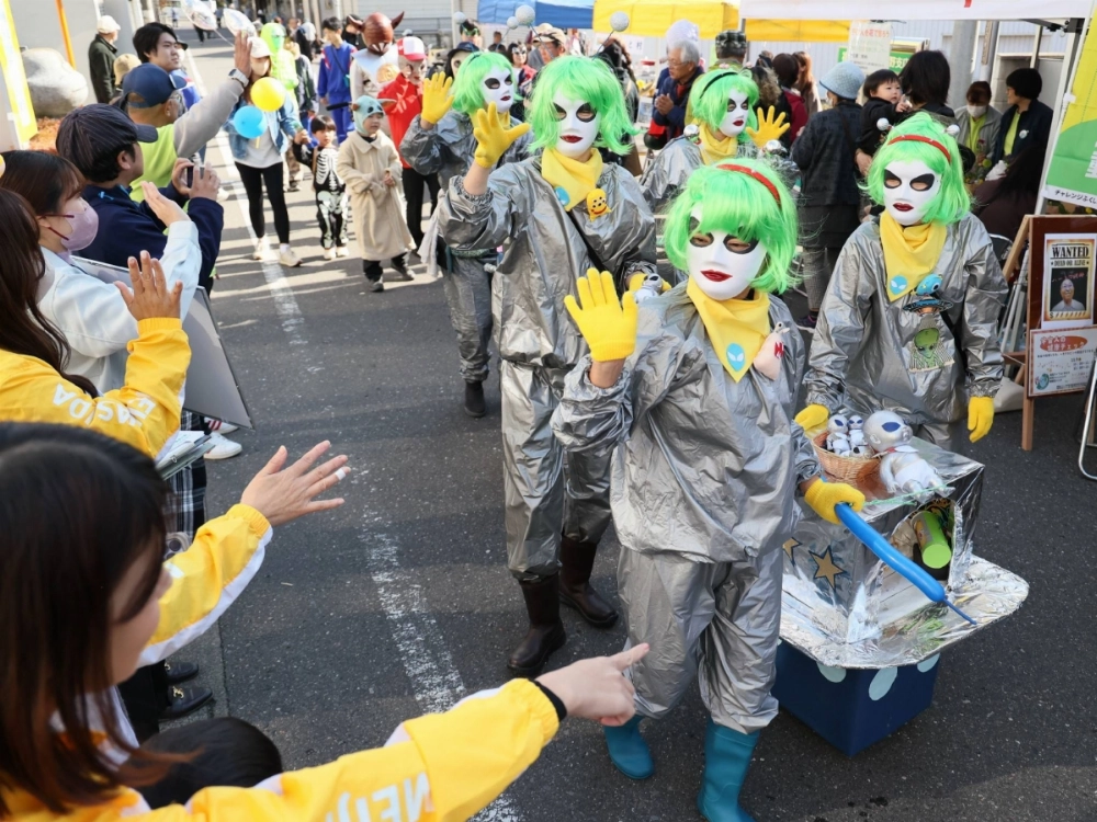 Visitors to a UFO festival in the town of Iino in the city of Fukushima turn up dressed as aliens and other characters in November last year. Visitors to a UFO festival in the town of Iino in the city of Fukushima turn up dressed as aliens and other characters in November last year.