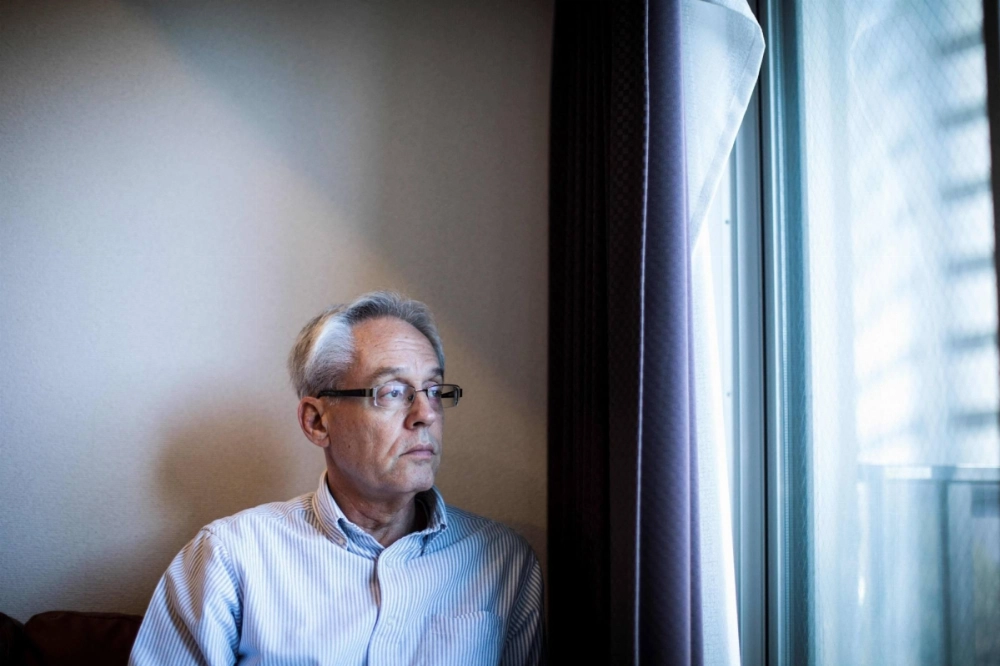 Former Nissan executive Greg Kelly in his Tokyo apartment in February 2020. He returned to the United States after the first verdict nearly three years ago in which he was given a suspended prison sentence. Former Nissan executive Greg Kelly in his Tokyo apartment in February 2020. He returned to the United States after the first verdict nearly three years ago in which he was given a suspended prison sentence.