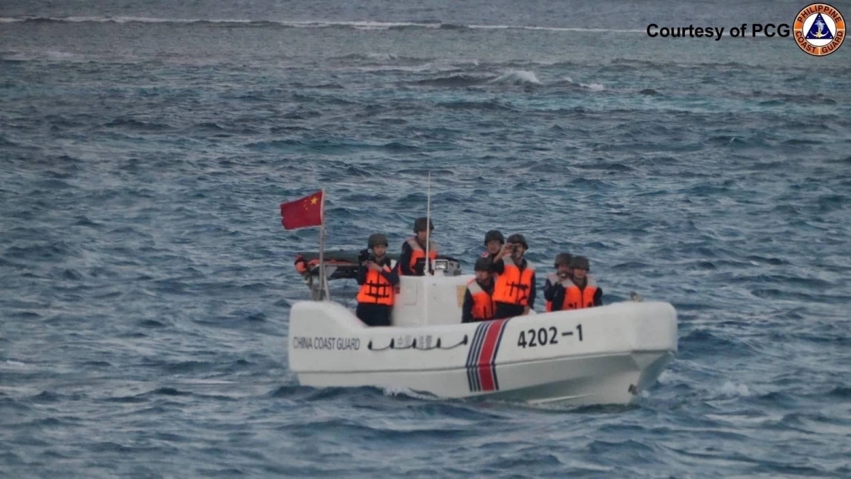 China Coast Guard officers check an incident involving the Philippine Bureau of Fisheries and Aquatic Resources during a marine scientific survey near Thitu Island in the South China Sea on Jan. 24. The Philippines accused the Chinese Navy and coast guard of harassing its government vessels taking part in a scientific survey in the waters. China Coast Guard officers check an incident involving the Philippine Bureau of Fisheries and Aquatic Resources during a marine scientific survey near Thitu Island in the South China Sea on Jan. 24. The Philippines accused the Chinese Navy and coast guard of harassing its government vessels taking part in a scientific survey in the waters.