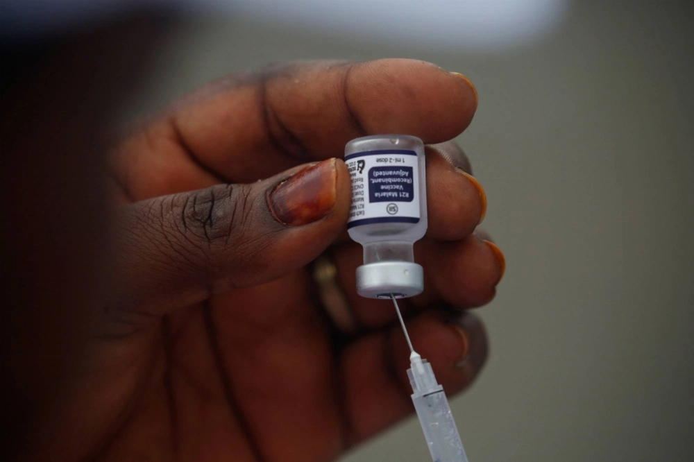 A health employee prepares a malaria vaccine in Abobo, a district of Abidjan, Ivory Coast, in July 2024. A health employee prepares a malaria vaccine in Abobo, a district of Abidjan, Ivory Coast, in July 2024.