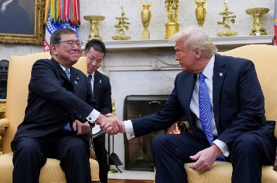 Prime Minister Shigeru Ishiba shakes hands with U.S. President Donald Trump at the White House in Washington on Friday. Prime Minister Shigeru Ishiba shakes hands with U.S. President Donald Trump at the White House in Washington on Friday.