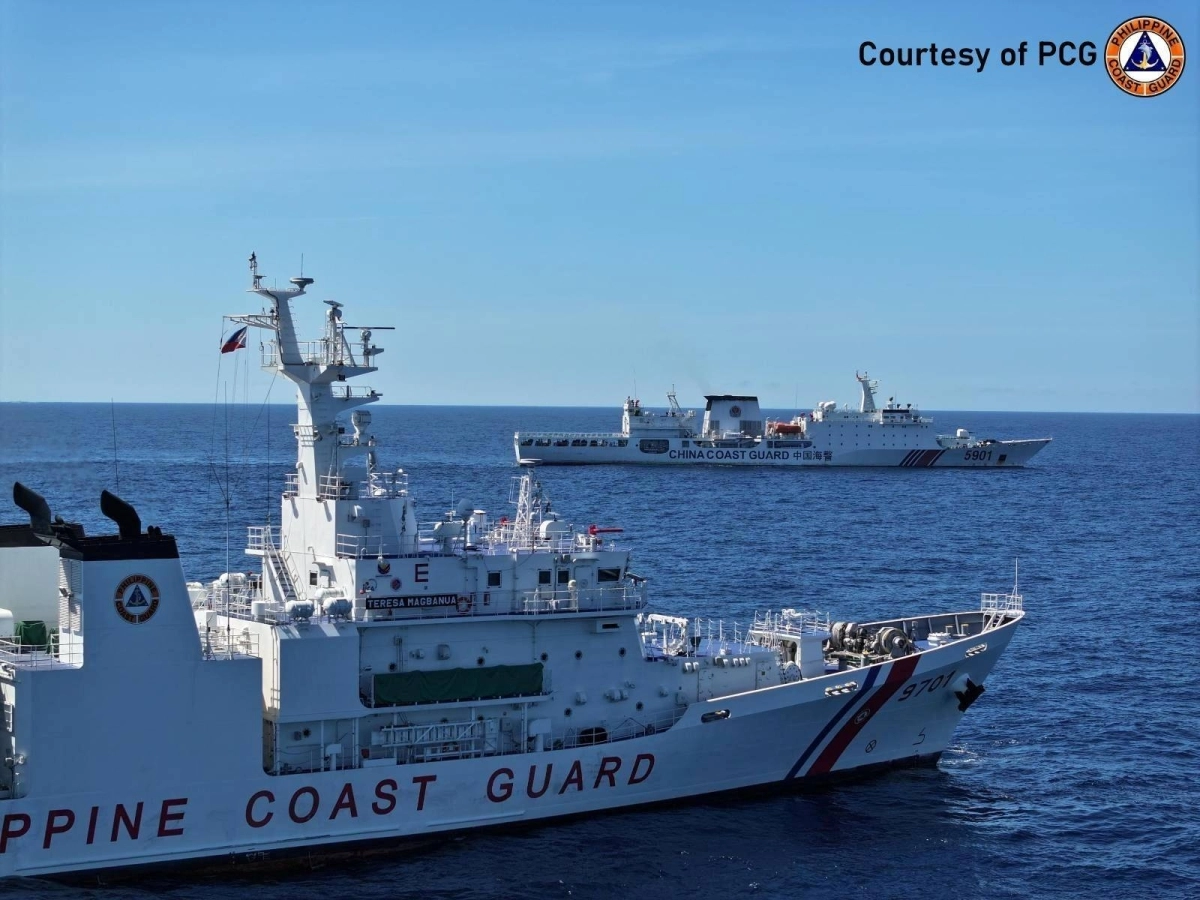 A Philippine Coast Guard vessel faces off against a China Coast Guard ship in the South China Sea. Encounters between Chinese and Philippine vessels have grown more tense in the strategically and economically important South China Sea, where the two nations have overlapping claims. A Philippine Coast Guard vessel faces off against a China Coast Guard ship in the South China Sea. Encounters between Chinese and Philippine vessels have grown more tense in the strategically and economically important South China Sea, where the two nations have overlapping claims.