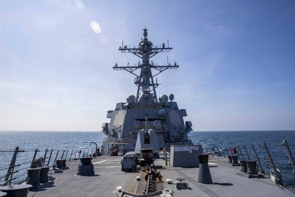 The U.S. Navy guided-missile destroyer USS Ralph Johnson conducts routine operations in the South China Sea last August. The vessel, along with survey ship USNS Bowditch, carried out a “routine” transit through the Taiwan Strait from Monday to Wednesday. The U.S. Navy guided-missile destroyer USS Ralph Johnson conducts routine operations in the South China Sea last August. The vessel, along with survey ship USNS Bowditch, carried out a “routine” transit through the Taiwan Strait from Monday to Wednesday.