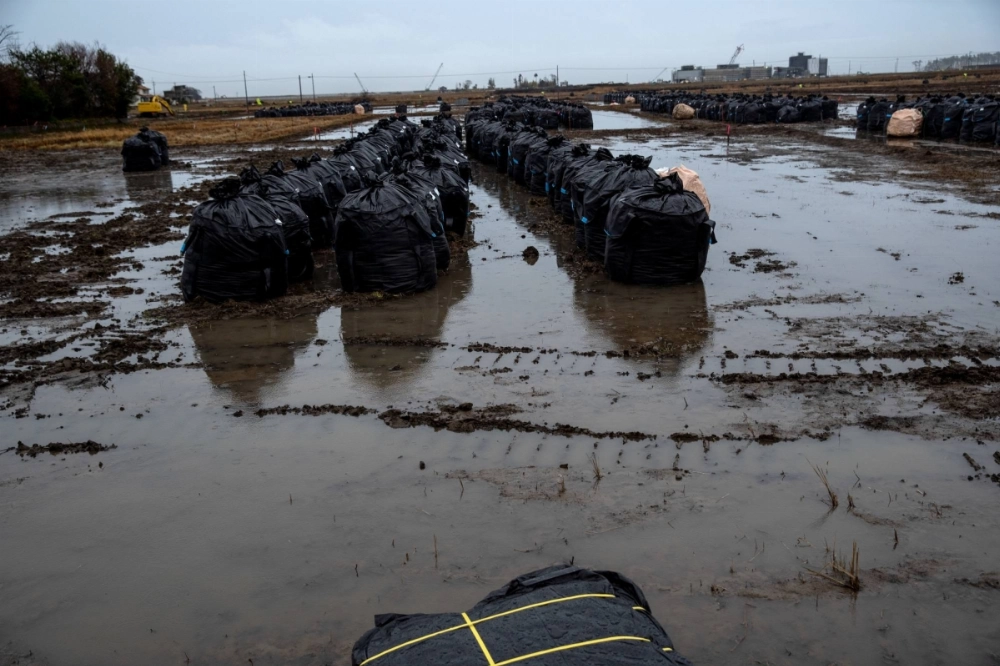 Plastic bags containing radiated soil are seen inside the exclusion zone around the Fukushima No. 1 nuclear power plant in Futaba, Fukushima Prefecture, in March 2020. Plastic bags containing radiated soil are seen inside the exclusion zone around the Fukushima No. 1 nuclear power plant in Futaba, Fukushima Prefecture, in March 2020.