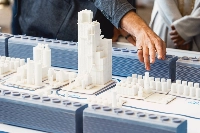 A model of a "direct air capture" facility during a groundbreaking ceremony at the Occidental Petroleum and 1PointFive DAC plant in Ector County, Texas, in April 2023. ANA has a purchase agreement for carbon removal credits with 1PointFive. | Bloomberg