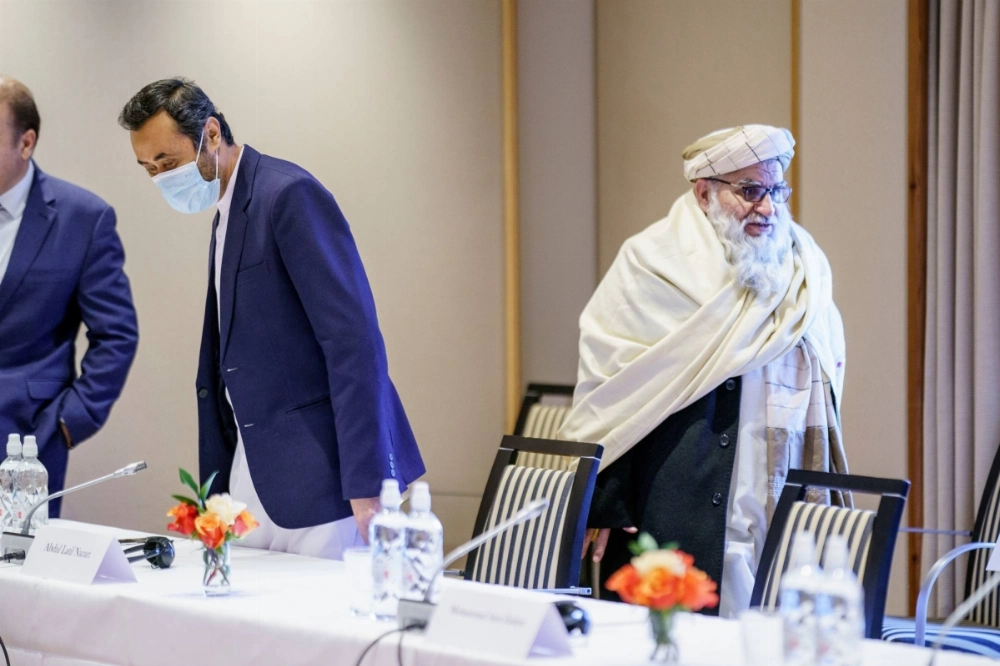 Taliban representatives Abdul Latif Nazari (center) and Mutiul Haq Nabi Kheel (right) attend a meeting of international special representatives in Oslo in January 2022.  Taliban representatives Abdul Latif Nazari (center) and Mutiul Haq Nabi Kheel (right) attend a meeting of international special representatives in Oslo in January 2022.