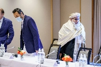 Taliban representatives Abdul Latif Nazari (center) and Mutiul Haq Nabi Kheel (right) attend a meeting of international special representatives in Oslo in January 2022.  |  NTB / via REUTERS