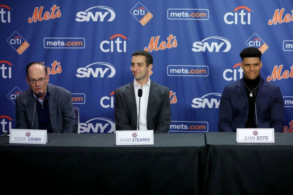 Mets owner Steve Cohen (left) speaks next to general manager David Stearns during a press conference to introduce right fielder Juan Soto at Citi Field on Dec. 12, 2024. Mets owner Steve Cohen (left) speaks next to general manager David Stearns during a press conference to introduce right fielder Juan Soto at Citi Field on Dec. 12, 2024.