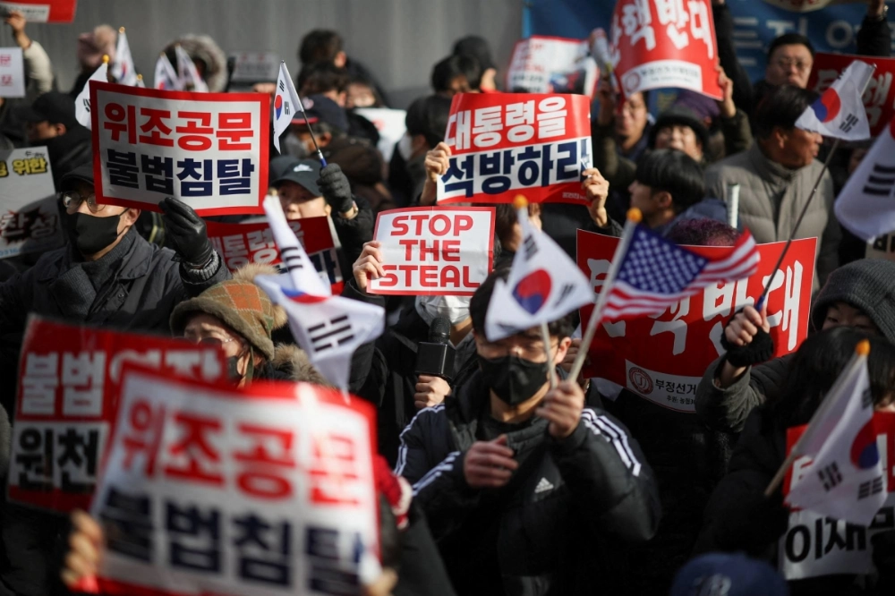 A rally in support of South Korea's impeached President Yoon Suk Yeol on Jan. 18. Young men have emerged as a key demographic that has come out in support of Yoon, in contrast to the many young women participating in protests opposing him. A rally in support of South Korea's impeached President Yoon Suk Yeol on Jan. 18. Young men have emerged as a key demographic that has come out in support of Yoon, in contrast to the many young women participating in protests opposing him.
