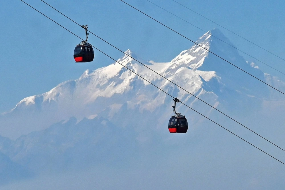 People ride in cable cars over the Chandragiri hilltop on the outskirts of Kathmandu on Feb. 3.  People ride in cable cars over the Chandragiri hilltop on the outskirts of Kathmandu on Feb. 3.