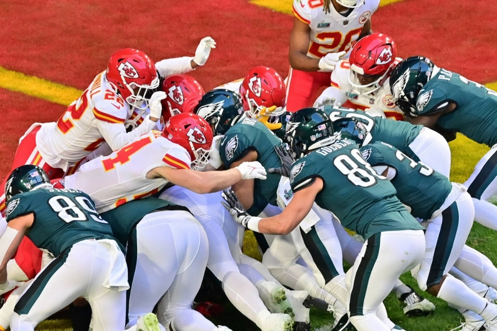 The Eagles use the tush push to score against the Chiefs during the Super Bowl in Glendale, Arizona, on Feb. 12. The Eagles use the tush push to score against the Chiefs during the Super Bowl in Glendale, Arizona, on Feb. 12.