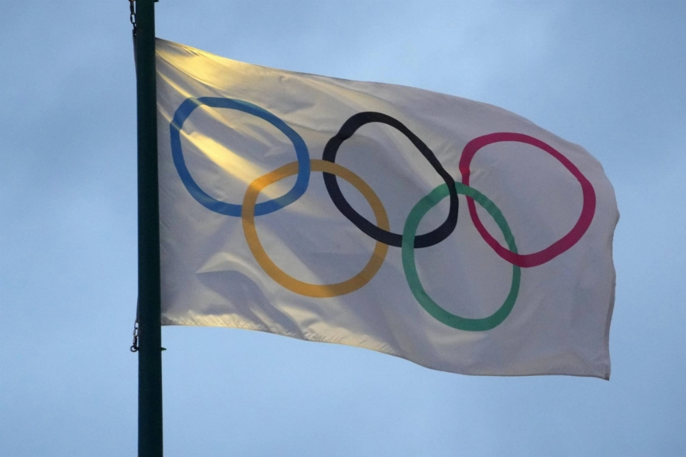The Olympic flag flies at Centennial Park in Atlanta on Jan. 19. The Olympic flag flies at Centennial Park in Atlanta on Jan. 19.