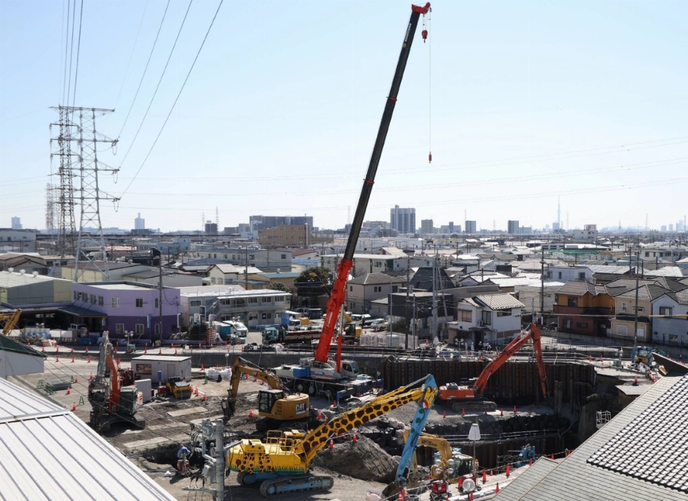 The site of a sinkhole in Yashio City, Saitama Prefecture, on Tuesday as recovery work continues. The site of a sinkhole in Yashio City, Saitama Prefecture, on Tuesday as recovery work continues.