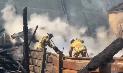 A screenshot from a video posted by the Fire and Disaster Management Agency on X on Friday shows firefighters trying to put out the fire in Ofunato, Iwate Prefecture. A screenshot from a video posted by the Fire and Disaster Management Agency on X on Friday shows firefighters trying to put out the fire in Ofunato, Iwate Prefecture.