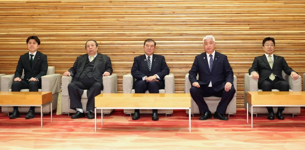 Prime Minister Shigeru Ishiba (center) at the Prime Minister's Office on Friday. The Cabinet has decided to spend an additional ¥106.8 billion ($710 million) from its fiscal 2024 budget reserve funds on disaster relief for areas hit by the Noto Peninsula earthquake last year. Prime Minister Shigeru Ishiba (center) at the Prime Minister's Office on Friday. The Cabinet has decided to spend an additional ¥106.8 billion ($710 million) from its fiscal 2024 budget reserve funds on disaster relief for areas hit by the Noto Peninsula earthquake last year.