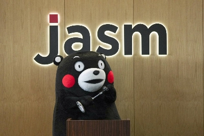 Kumamon, the official mascot of Kumamoto Prefecture, poses in front of a sign of Japan Advanced Semiconductor Manufacturing, a subsidiary of Taiwan Semiconductor Manufacturing Co., at TSMC's then new factory in Kikuyo, Kumamoto Prefecture, in February 2024.  Kumamon, the official mascot of Kumamoto Prefecture, poses in front of a sign of Japan Advanced Semiconductor Manufacturing, a subsidiary of Taiwan Semiconductor Manufacturing Co., at TSMC's then new factory in Kikuyo, Kumamoto Prefecture, in February 2024.