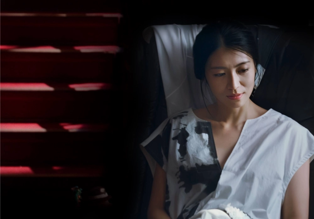 Kumi Takiuchi plays a prostitute talking about her life’s pains and pleasures in detail to a psychiatrist in “Reveal.” Kumi Takiuchi plays a prostitute talking about her life’s pains and pleasures in detail to a psychiatrist in “Reveal.”