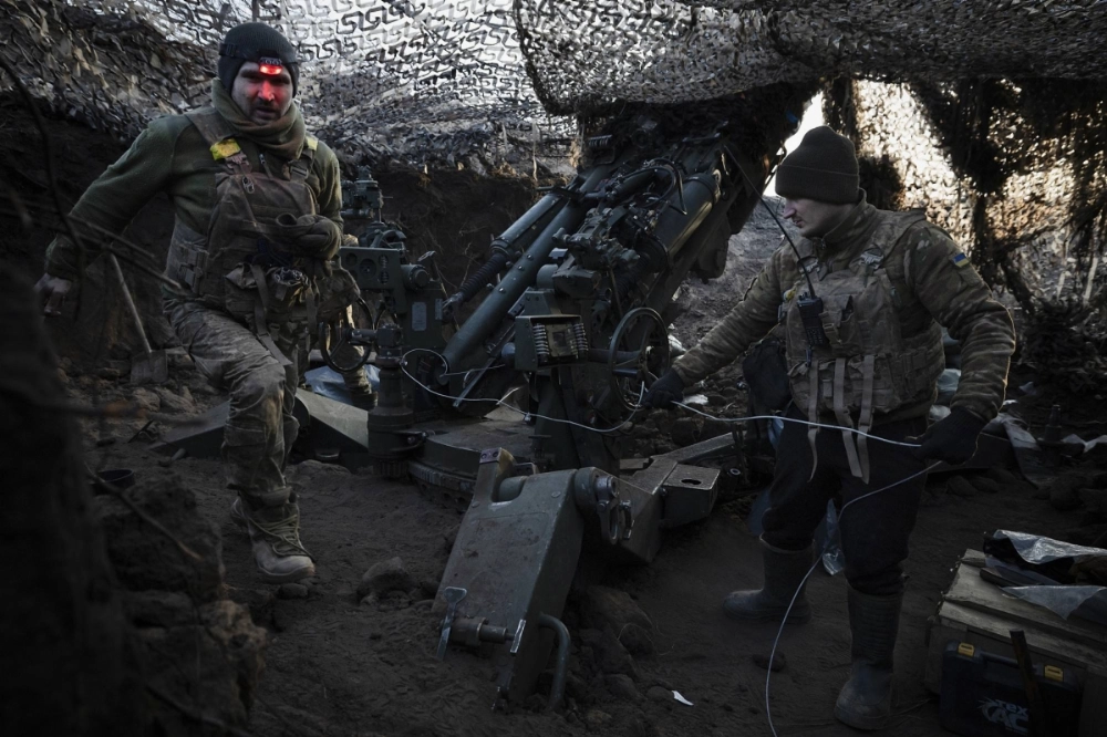 An M777 howitzer crew firing at Russian targets near the front lines of the Dnipro region, Ukraine, on Feb. 12 An M777 howitzer crew firing at Russian targets near the front lines of the Dnipro region, Ukraine, on Feb. 12