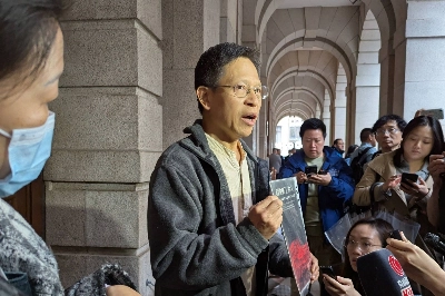Hong Kong activist Tang Ngok-kwan speaks to reporters in Hong Kong on Thursday after the Court of Final Appeal ruled in his favor and quashed his jail term for refusing to hand over information to the city's national security police. Hong Kong activist Tang Ngok-kwan speaks to reporters in Hong Kong on Thursday after the Court of Final Appeal ruled in his favor and quashed his jail term for refusing to hand over information to the city's national security police.