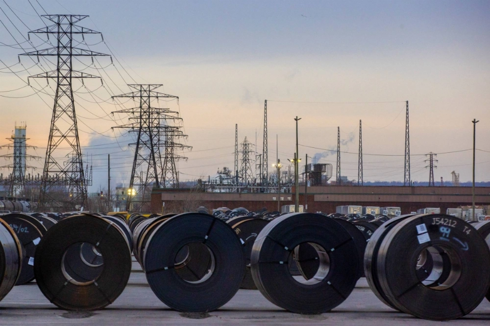 Coils of rolled steel sit in an industrial yard in Hamilton, Ontario, Canada Coils of rolled steel sit in an industrial yard in Hamilton, Ontario, Canada