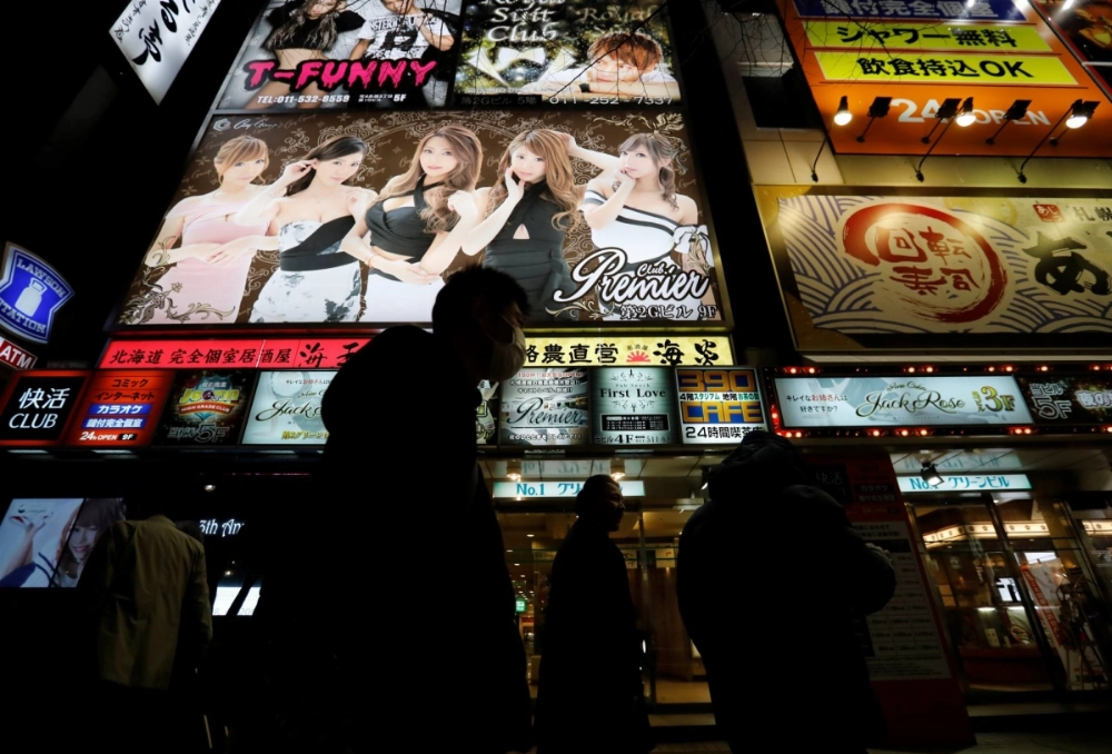 The Susukino district in Sapporo in 2020. The father of a woman suspected of killing and beheading a man in the entertainment district in 2023 was sentenced on Wednesday to one year and 4 months in prison, suspended for four years, for helping her move the body to their home. The Susukino district in Sapporo in 2020. The father of a woman suspected of killing and beheading a man in the entertainment district in 2023 was sentenced on Wednesday to one year and 4 months in prison, suspended for four years, for helping her move the body to their home.