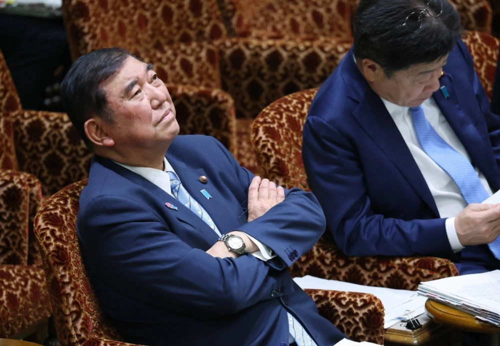 Prime Minister Shigeru Ishiba attends an Upper House Budget Committee session in Tokyo on Monday. Prime Minister Shigeru Ishiba attends an Upper House Budget Committee session in Tokyo on Monday.