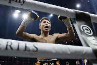Naoya Inoue celebrates after winning a fight in Glasgow, Scotland, in 2019. Inoue has fought eight times in Japan since his last overseas bout, a KO against Michael Dasmarinas in Las Vegas in June 2021. | Action Images / via Reuters
